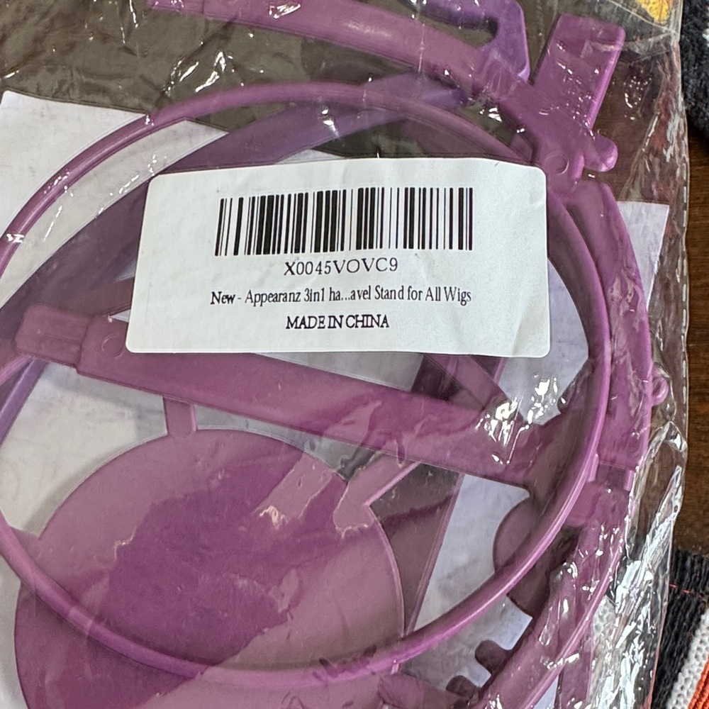 Source Unknown Purple Wig Stand